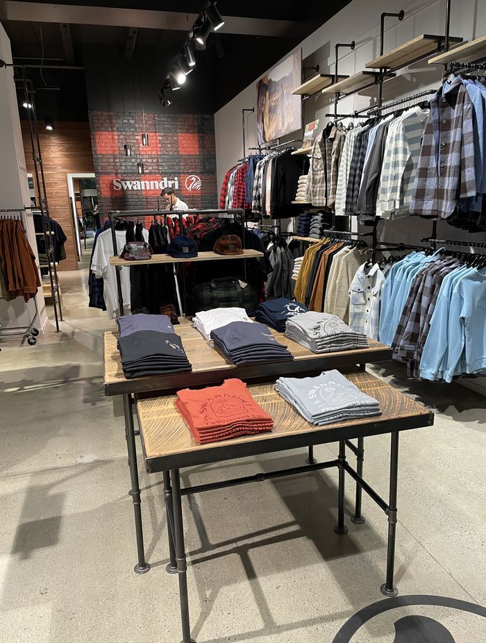 Swanndri nailed the rustic industrial look in their store fit-out.
