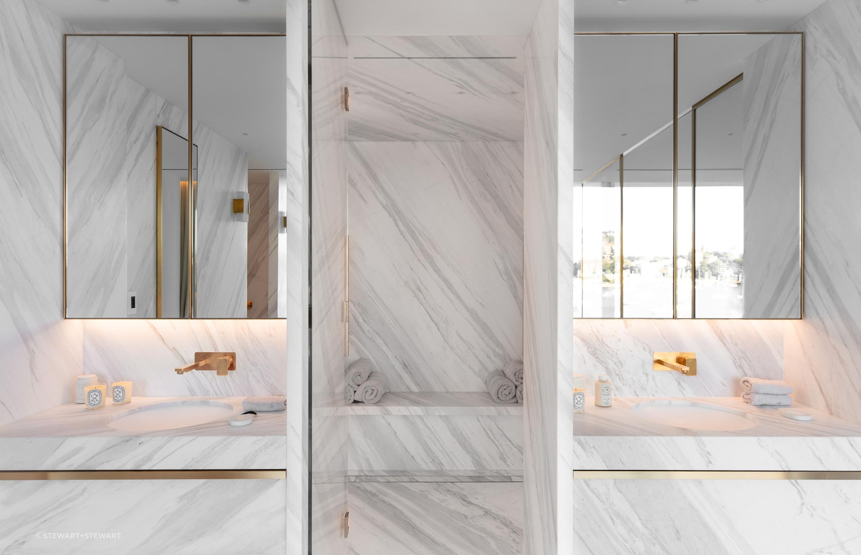 Imperial White marble brings an air of elegance and luxury throughout.