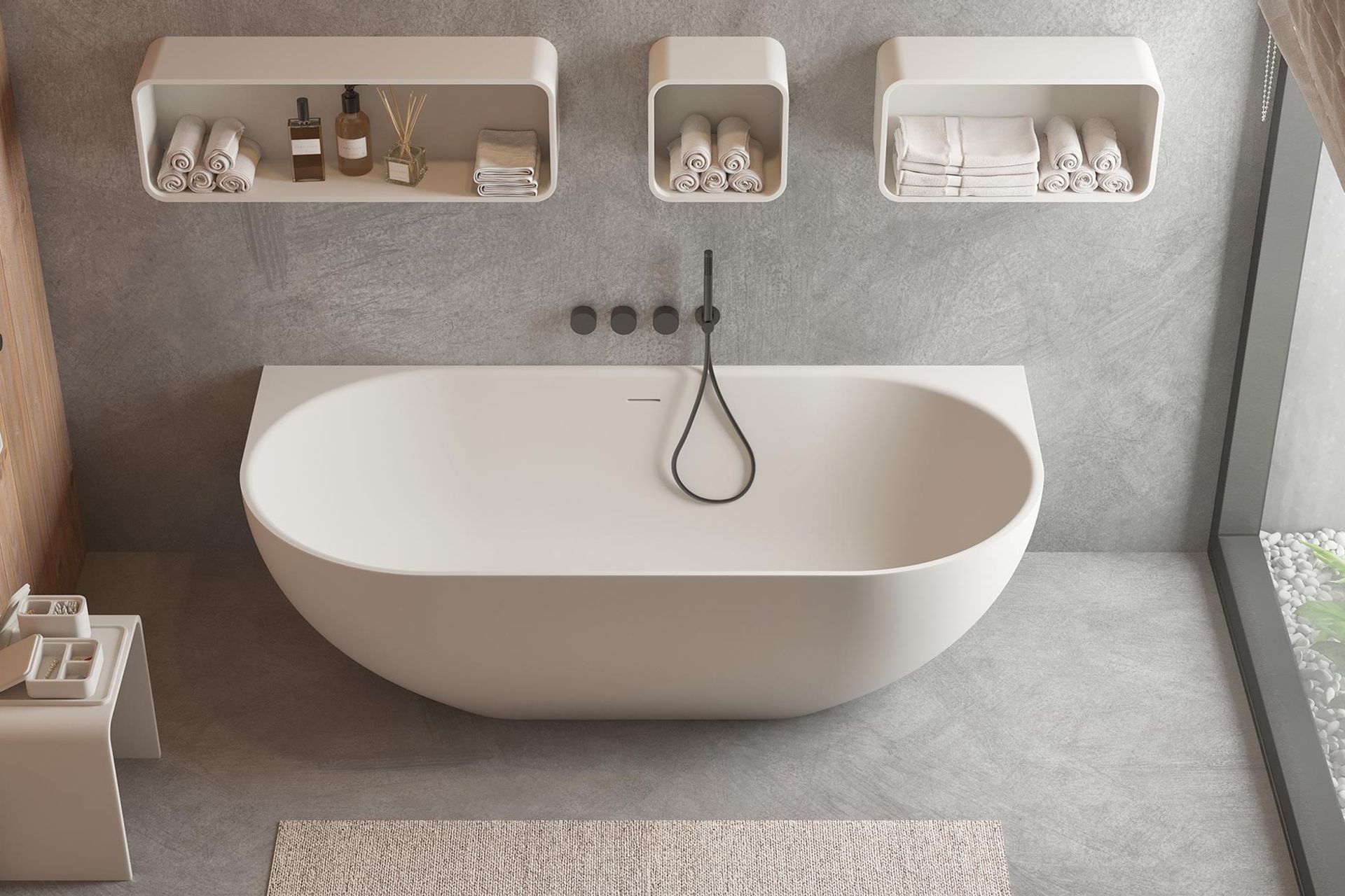 The Justina Back-to-Wall Stone Bath captures a beautiful, contemporary aesthetic and is easy to clean and maintain too.