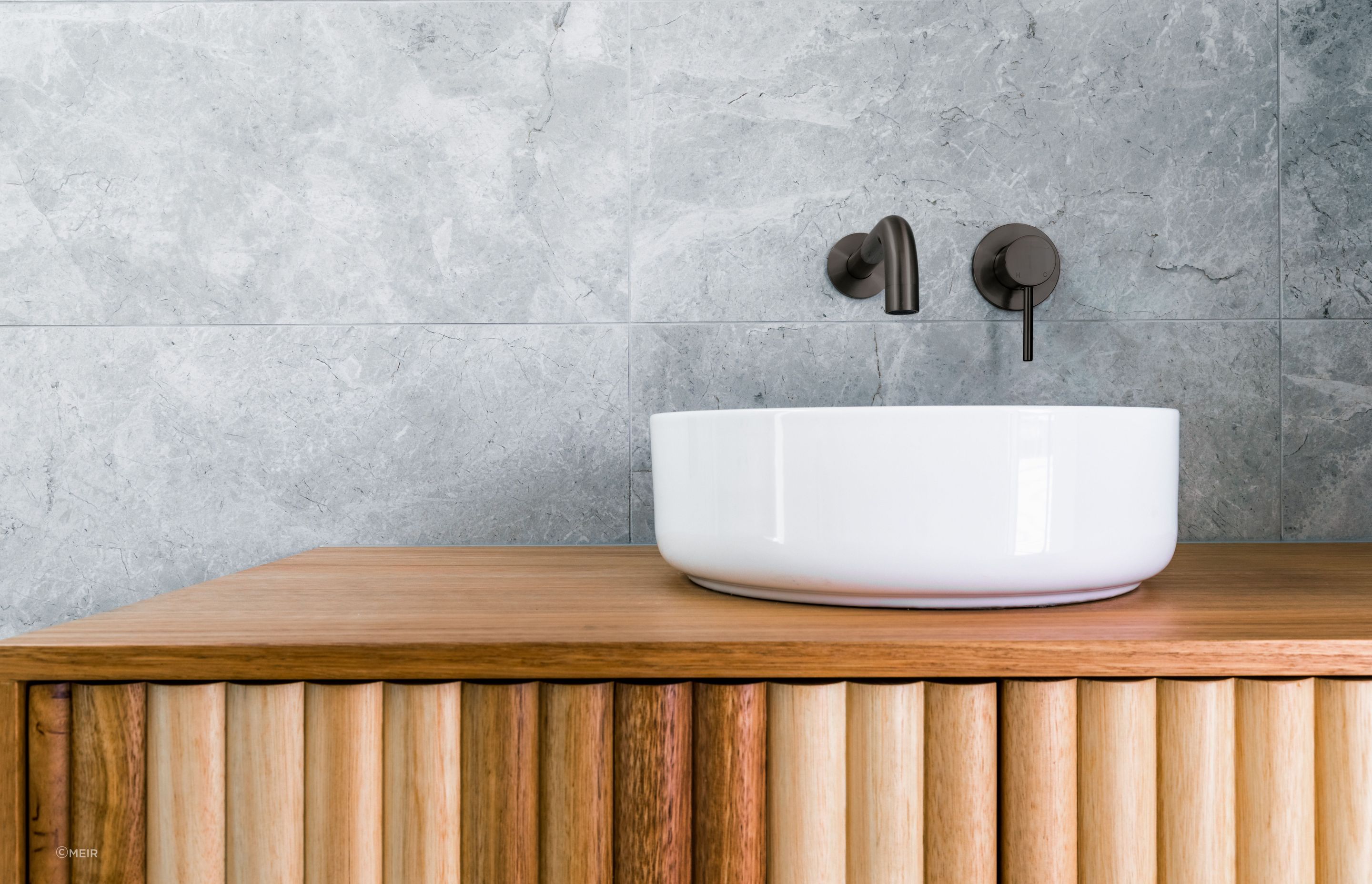 The stylish Round Curved Spout in a shadow finish