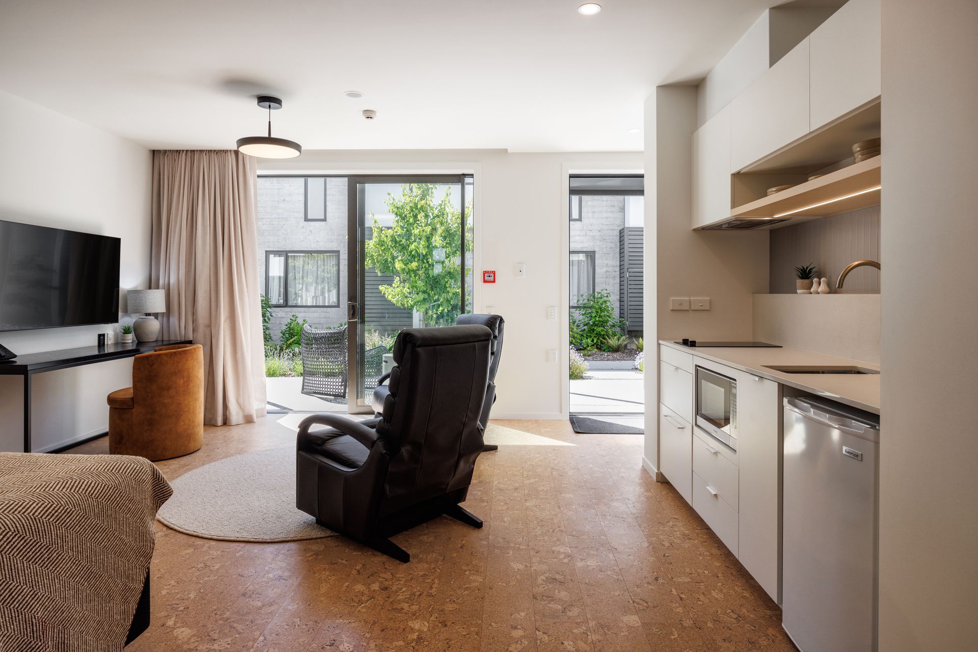 “The design team selected Quantum's Wise Cork in Original Shell to align with the natural theme of the NZCIS interiors. The cork planks provided a unique aesthetic that distinguished the apartments from other accommodation options. Additionally, the natural properties of cork, such as warmth and acoustic benefits, made it an ideal choice for this high-performance environment.”