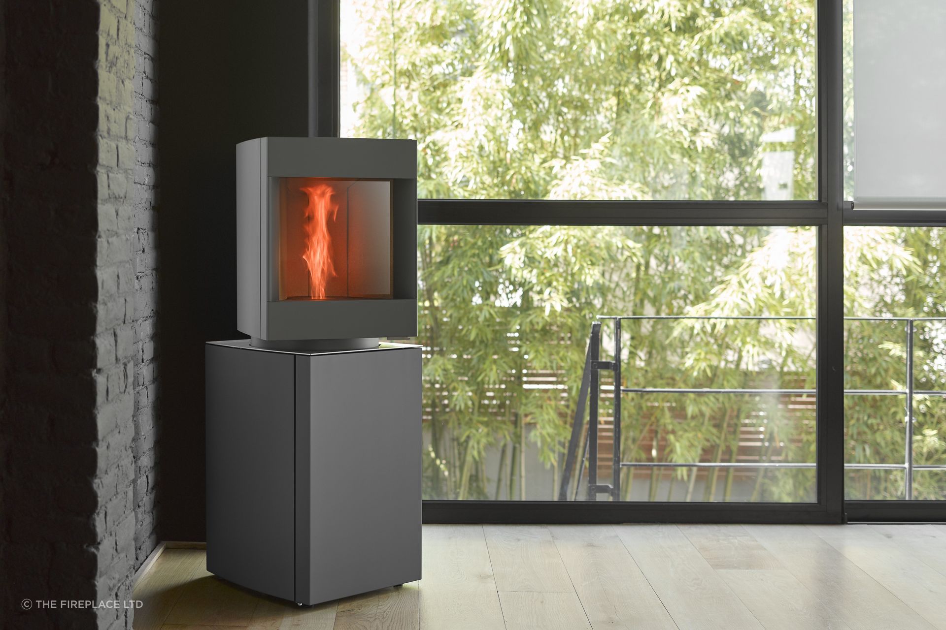 The award winning Stûv P-10 pellet freestanding fire comprises two distinct sections: at the top is a real fire, designed to show off the flames, while underneath there is a stock of wood pellets and the technical components.