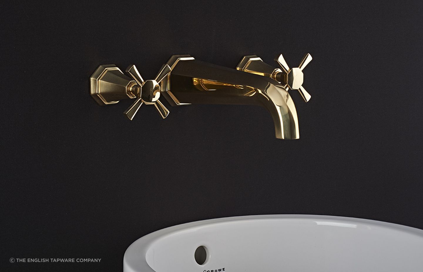The undeniable allure of gold, seen here with the Perrin & Rowe Deco Wall Mounted Basin Taps