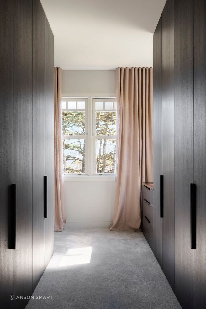 Edge Pull handles provide symmetry in the dressing room.