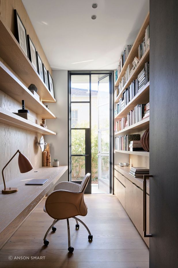 The entrance to the private office features the Mid Antique Brass Waxed finish.