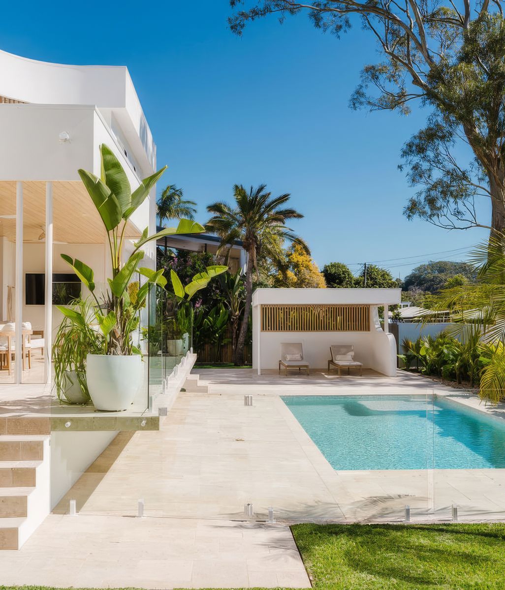 Natural travertine brings resort-style luxury to this Sunshine Coast residence