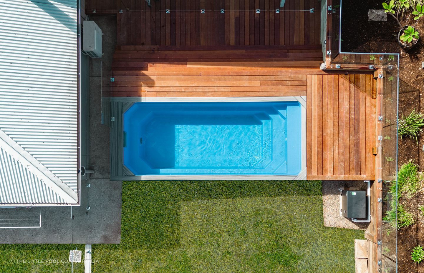A site with a slope is an ideal location for a Little Pool Co above-ground pool.