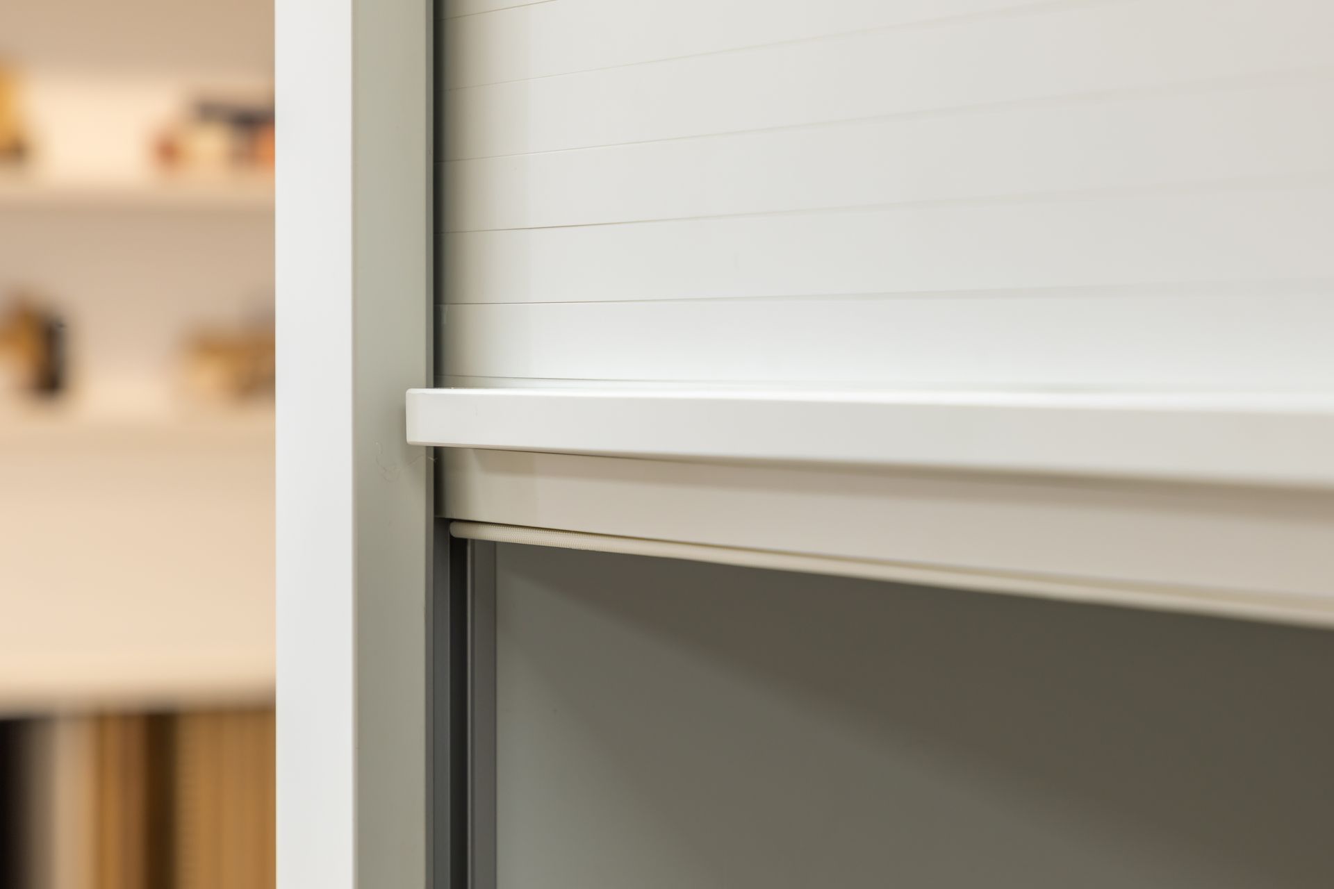 Roller door Acrymatte in 'Coconut' with a bar handle.