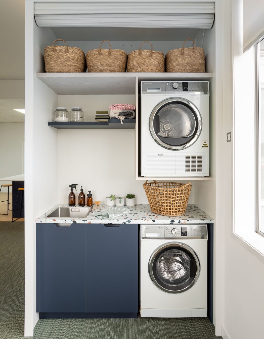 Roller doors are the perfect solution for a laundry cupboard.
