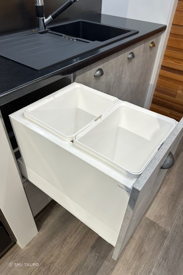 "The FLEX range offers optimal utilisation of the cabinet space, with options to place a 2 x 18L bin system into a 350mm cabinet, all while integrating with most slimwall soft closing drawers.” Picture: Tanova FLEX in White Shown on Merivobox Drawer.