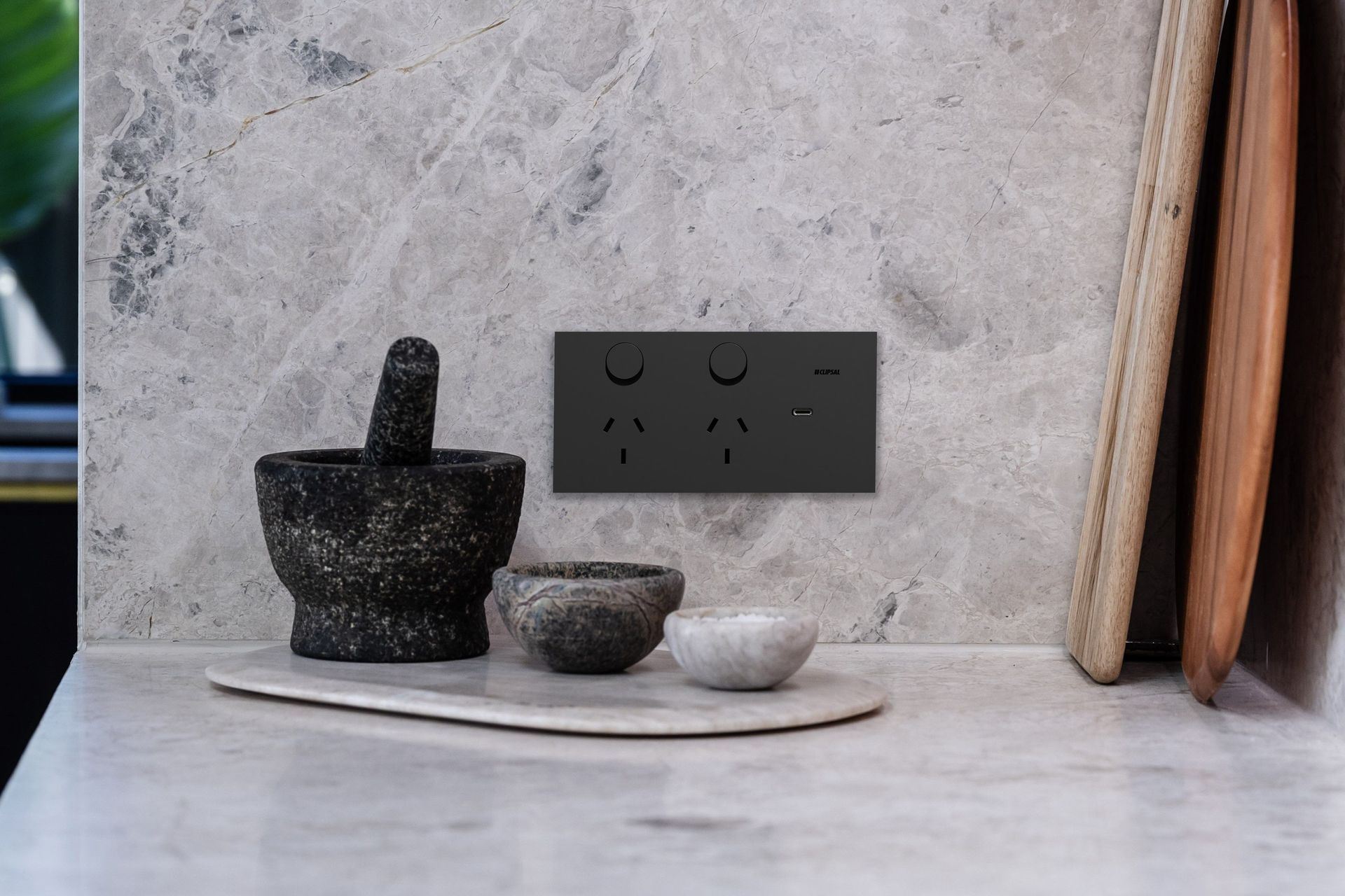 The new Clipsal Solis collection blends minimalism with smart home functionality, setting a luxurious new benchmark in electrical design. Image: Clipsal Solis Double Switch Power Point in Matte Black.