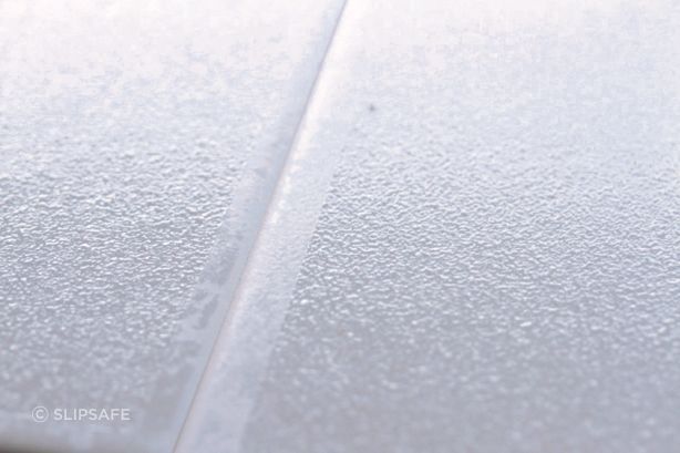 A close-up of Swiss Grip shows its textured surface.