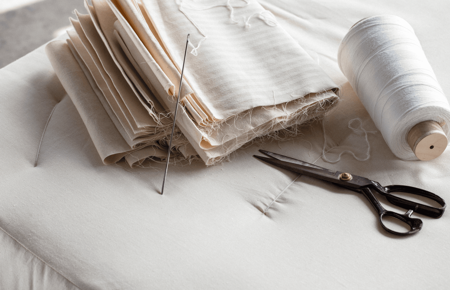 The organic mattresses are hand-sewn with huge tufting needles.