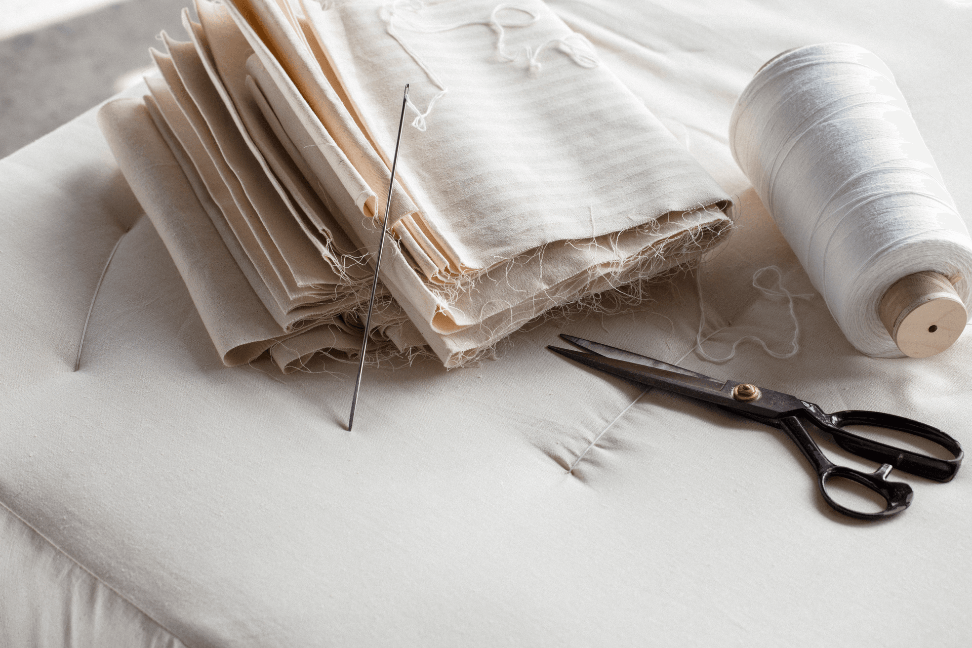 The organic mattresses are hand-sewn with huge tufting needles.