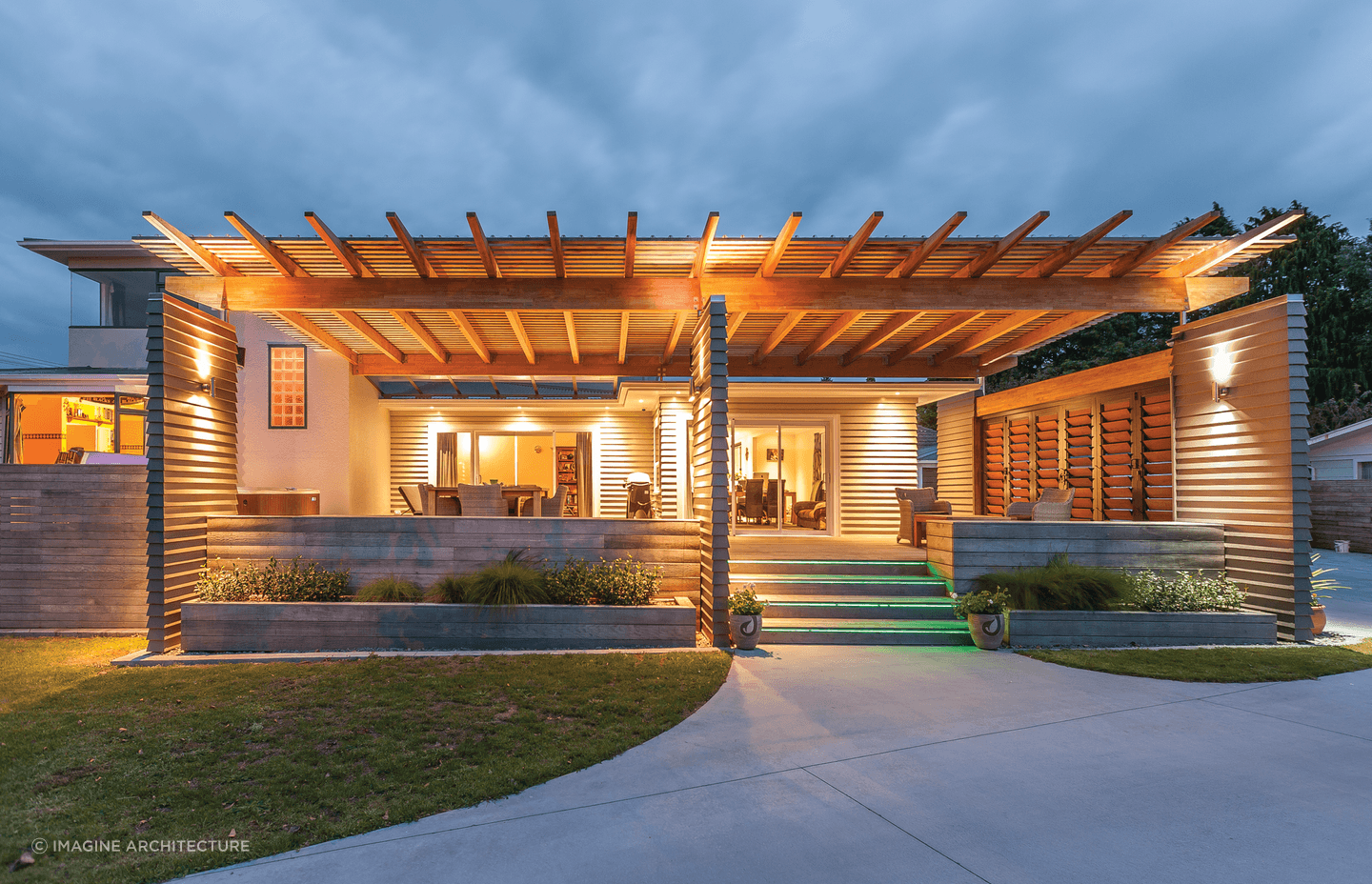 An excellent mix of downlights, wall lights and step lights and colour create incredible ambience in this 1950's weatherboard home