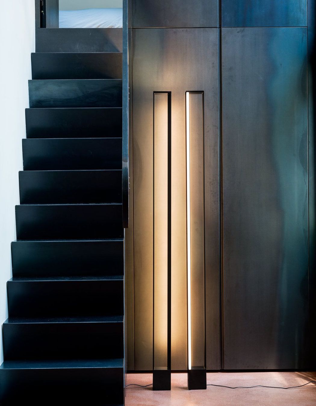 The majestic TRU Floor Lamp emits a peaceful, warming glow.