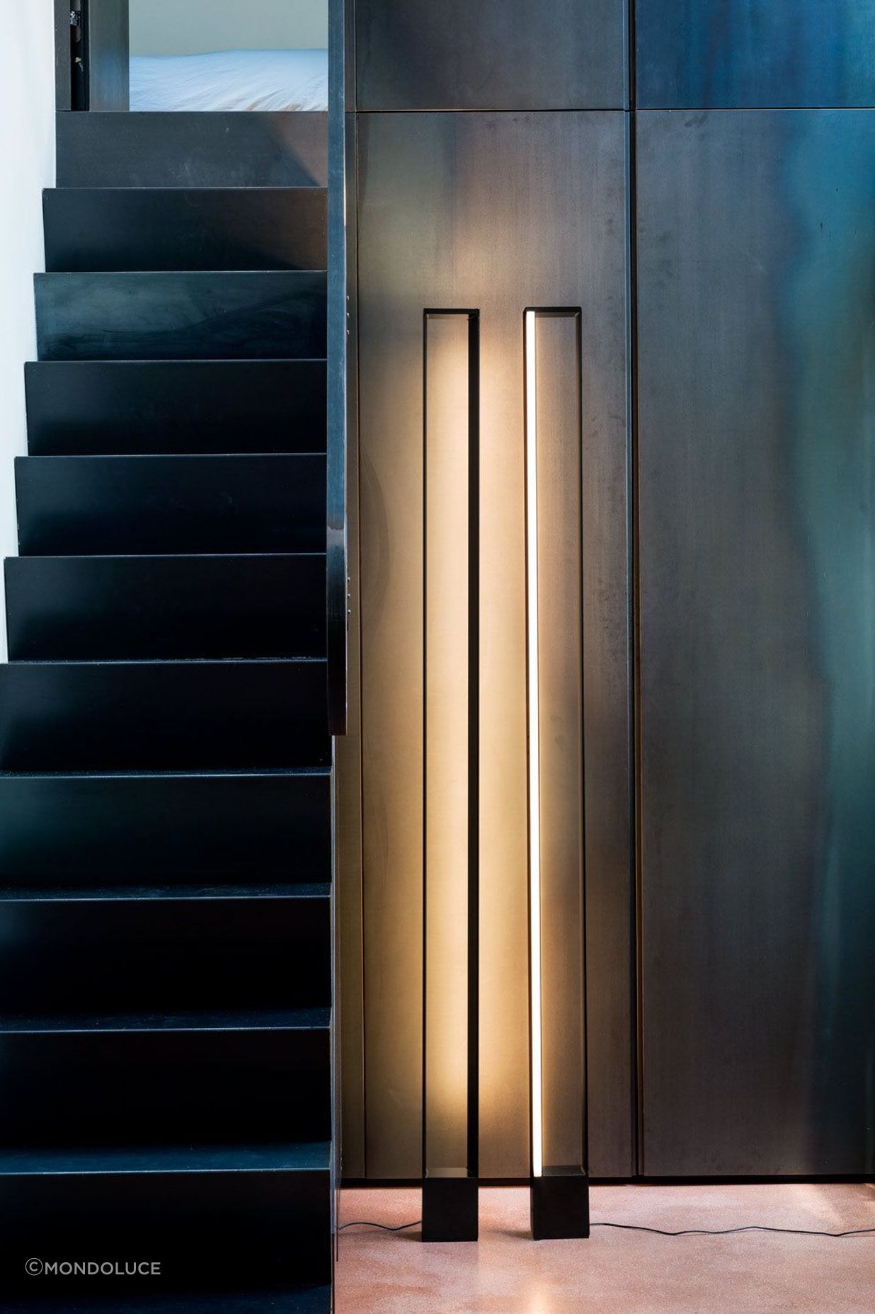 The majestic TRU Floor Lamp emits a peaceful, warming glow.