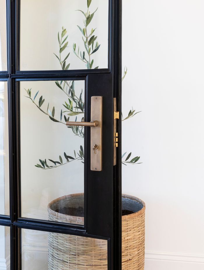 The Charleston entrance set in brass from Supreme Lock & Hardware.