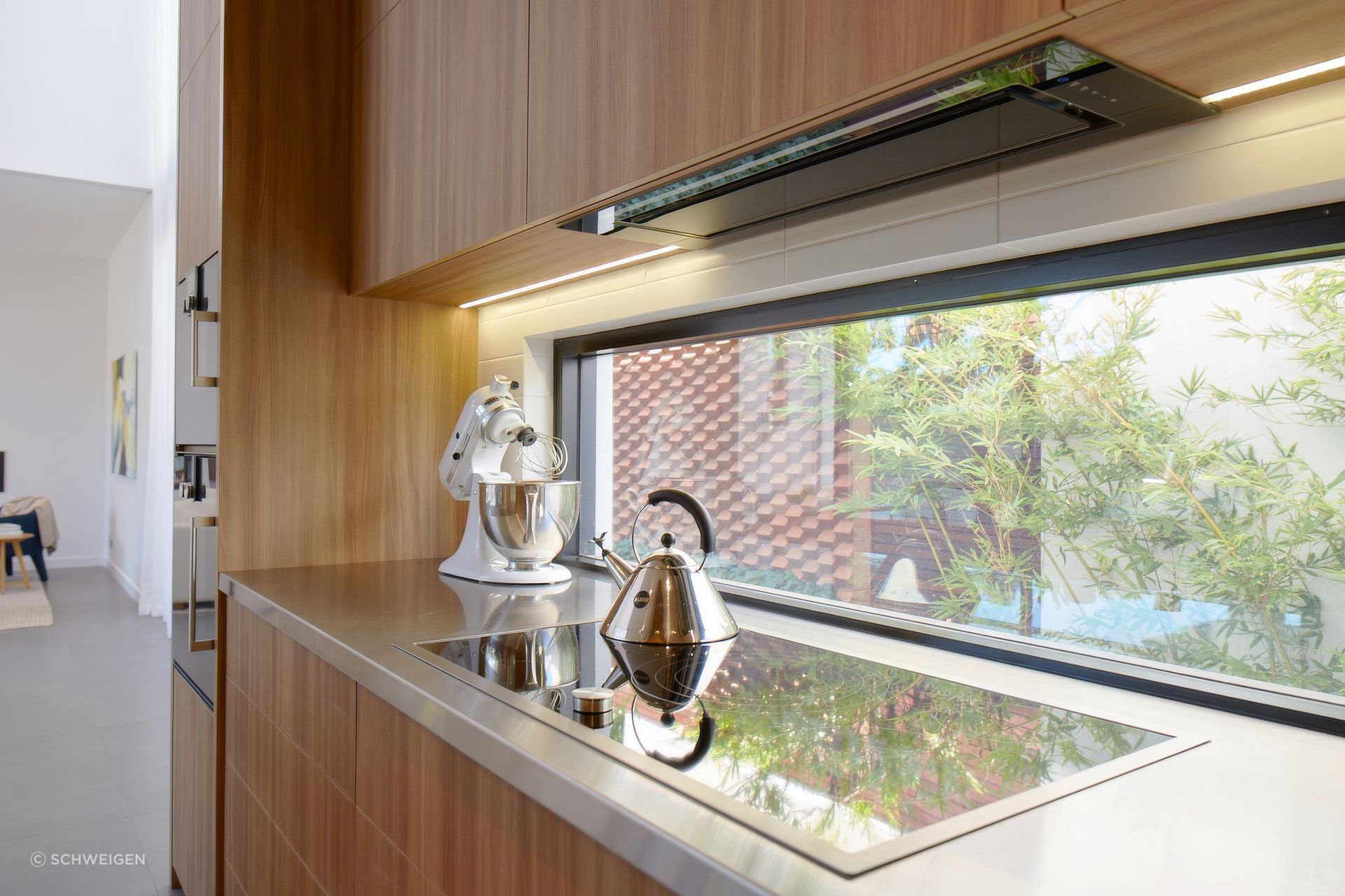 Kitchen by Austurban Homes, featuring the 
KLS-9GLASSBLKS Silent Black Glass Undermount Rangehood