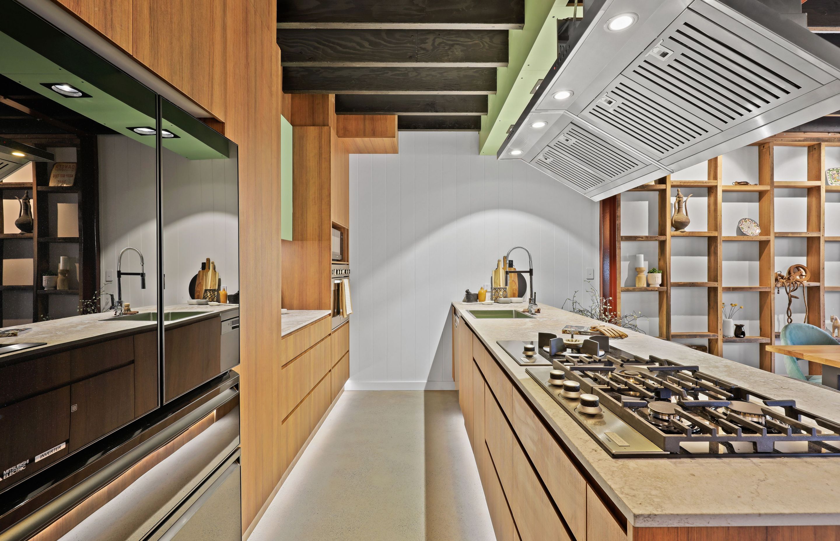 Warm woodgrain kitchen by JPC Kitchens