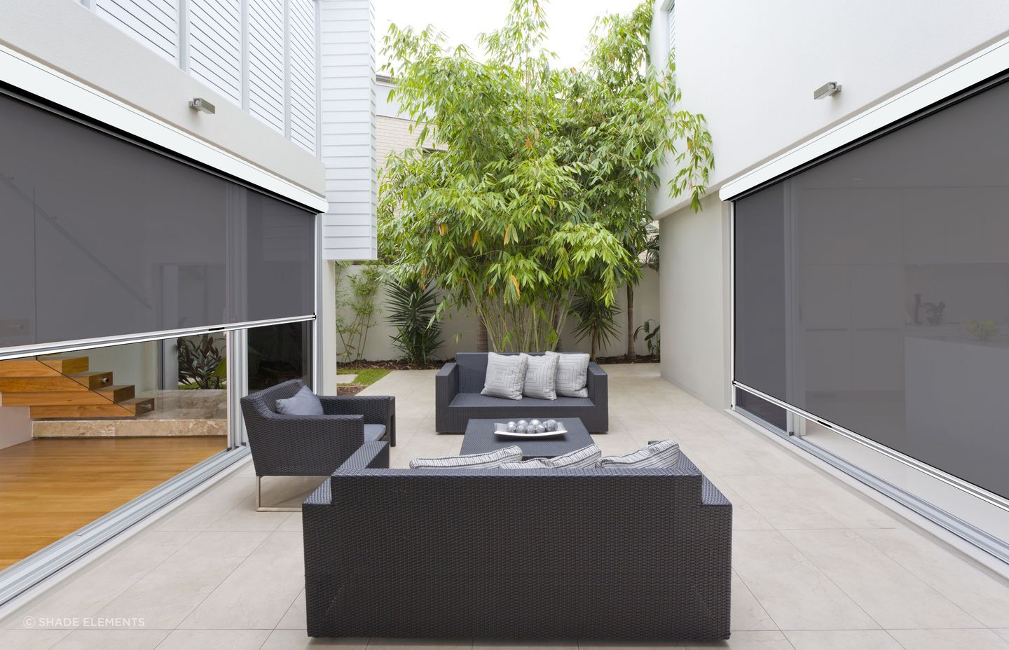 Outdoor shade with effortless sophistication with Ziptrak.
