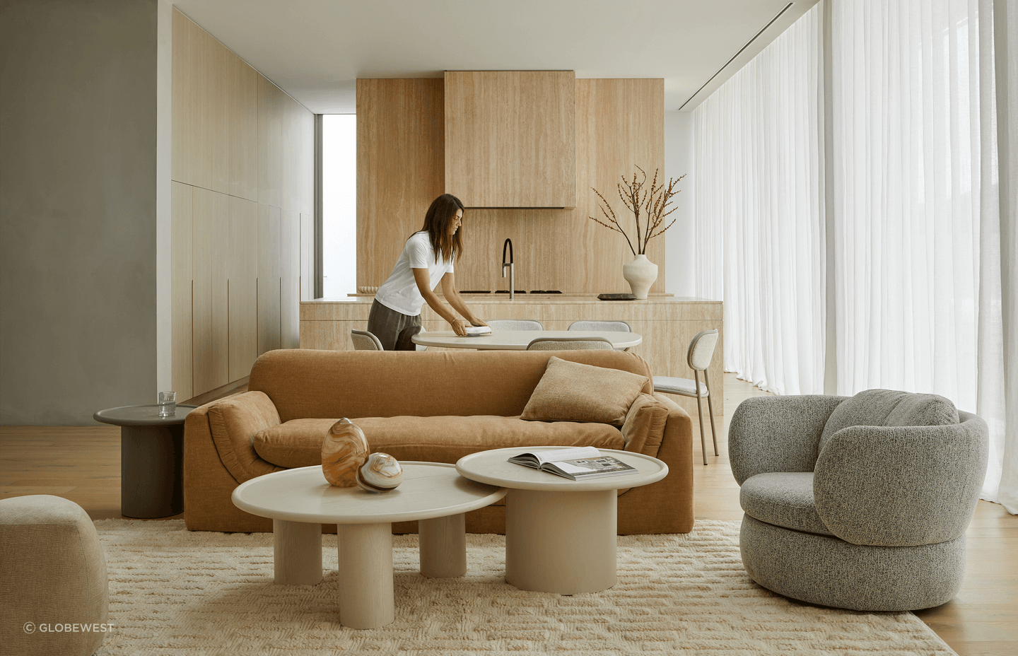 Curves and sculptural interest are celebrated in the new collection, paired with a warm and earthy palette.