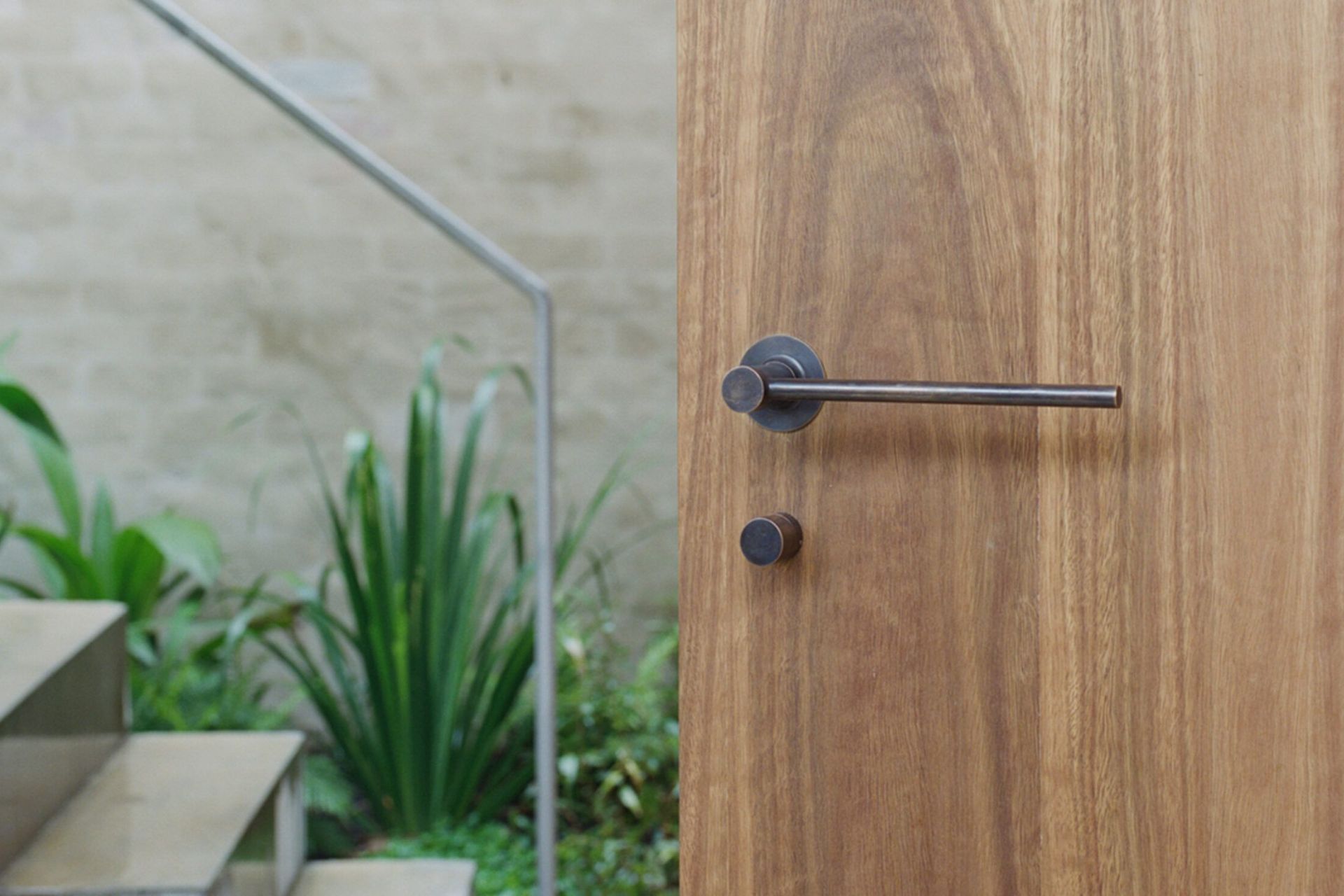 This bronze handle from Supreme Lock & Hardware showcases an aged patina.