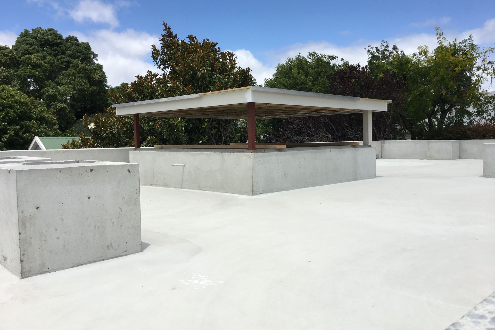 Layers are added meticulously, starting with the waterproofing membrane.