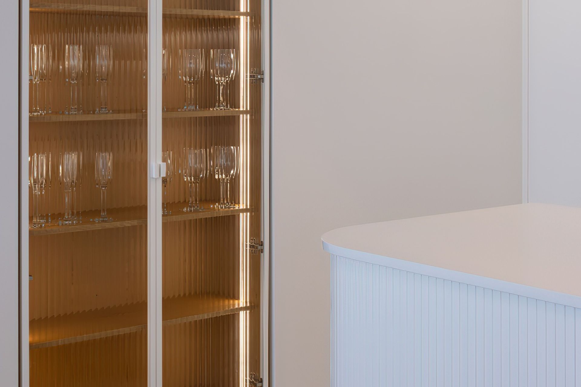 Squareline powder-coated with narrow reeded glass.