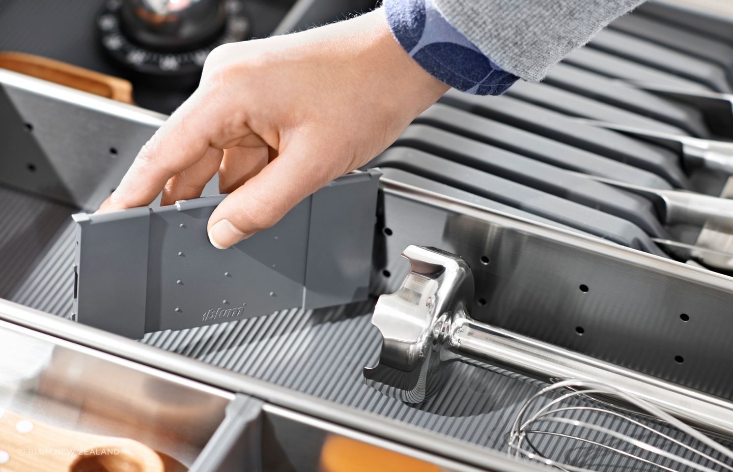 “ORGA-LINE features high-quality stainless steel trays and utensil dividers, which makes it easy to clean and dishwasher safe. The practical and flexible dividing system can be re-arranged according to the buyer's personal storage requirements.”