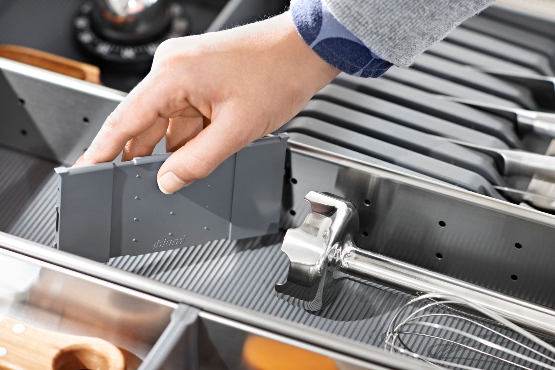 “ORGA-LINE features high-quality stainless steel trays and utensil dividers, which makes it easy to clean and dishwasher safe. The practical and flexible dividing system can be re-arranged according to the buyer's personal storage requirements.”