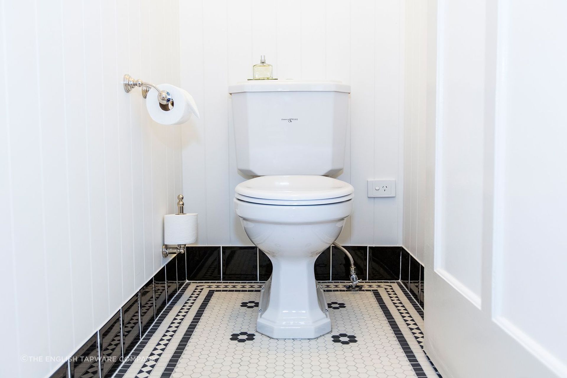This close coupled toilet suite by The English Tapware Company has a stately appearance