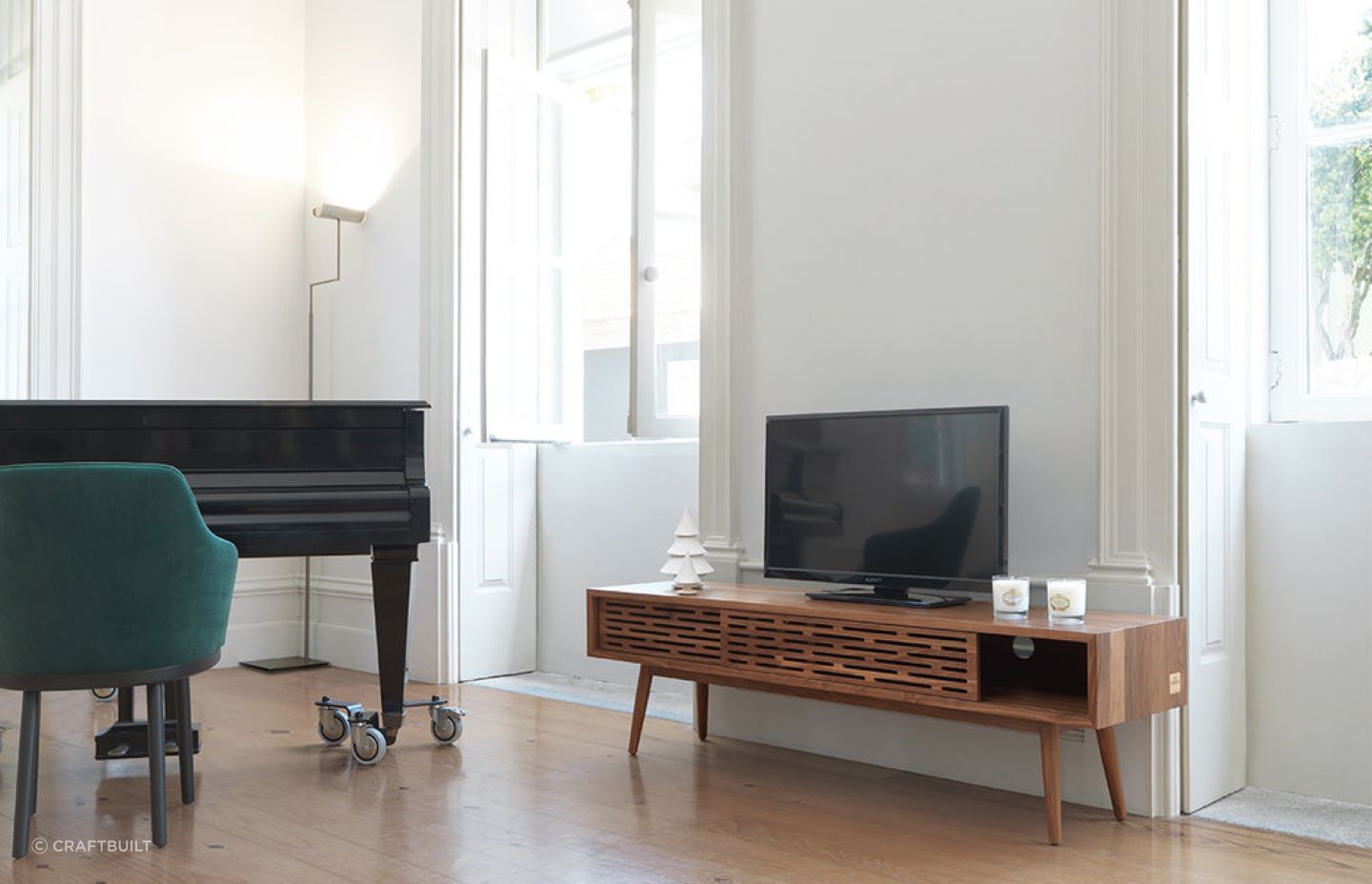 The visually elegant perforated sliding doors of the ALF Italia Novecento TV Cabinet are a great design feature.