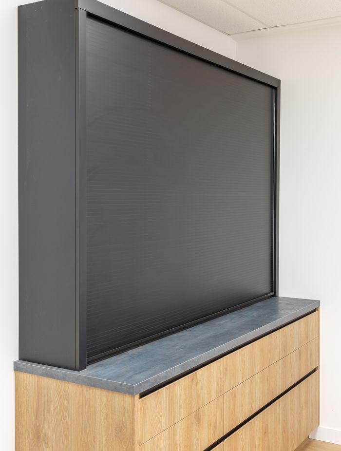 The roller door in Acrymatte is the perfect easy-to-wipe surface to hide the pantry shelves.