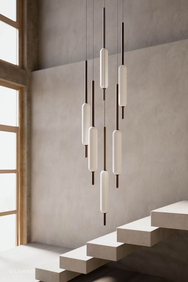 These pendant lights are held in stylish lighting fixtures