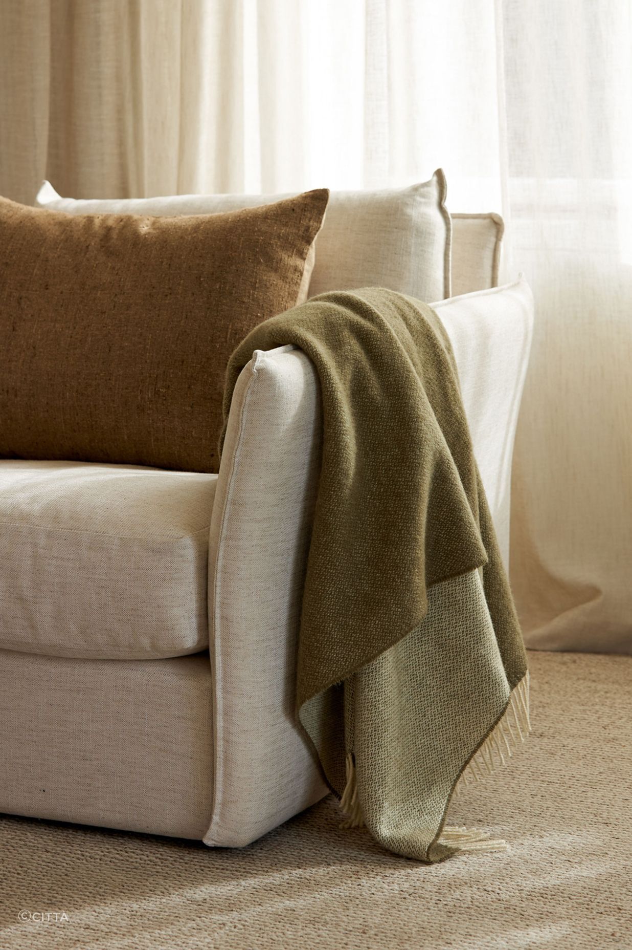 The natural colours of the New Zealand Wool Throw by Città