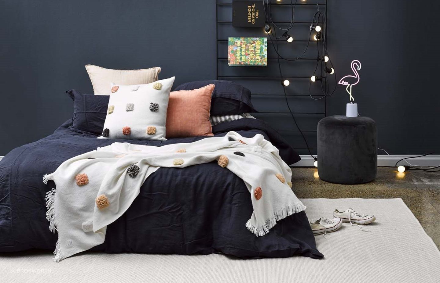 The Tussore Rug by Bremworth adds a touch of warmth and texture, enhancing the modern bedroom with its inviting, natural feel