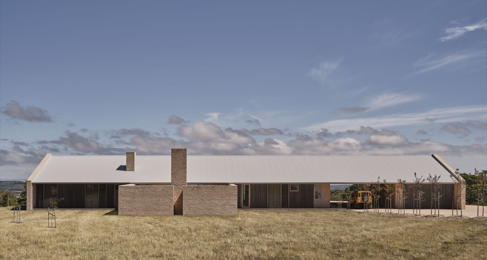 Perched on an exposed ridge above the Mornington Peninsula, Main Ridge Farmhouse balances refuge and expansiveness, using a simple, enduring form to frame vast rural views while creating a sheltered home for family life. Architecture: J. Kidman Architecture Photography: Rhiannon Taylor