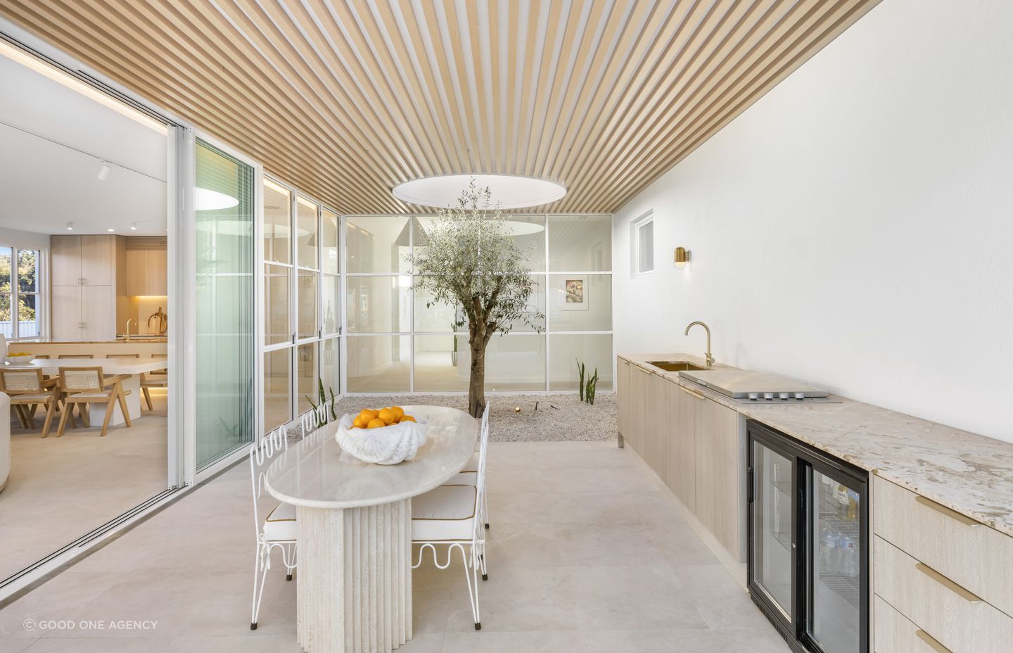 The Kellyville project by Map Architects brings light into the centre of the house through a courtyard with light well.