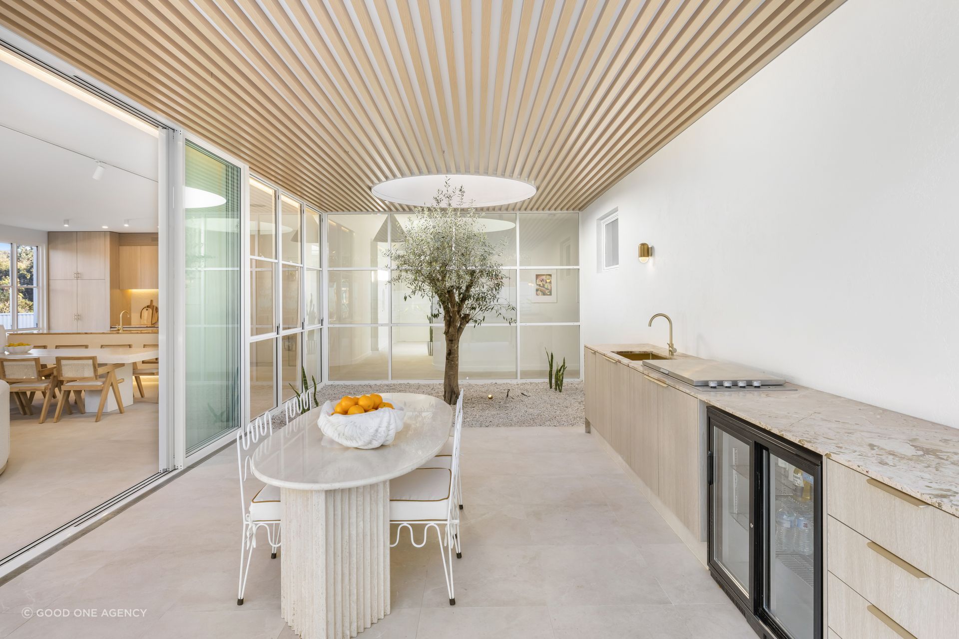 The Kellyville project by Map Architects brings light into the centre of the house through a courtyard with light well.