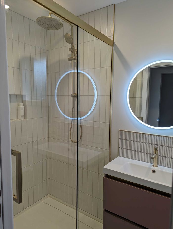 Bathrooms need to be uncluttered and easy to move about in. However, accessibility shouldn't mean less focus is placed on the look and feel of the space.