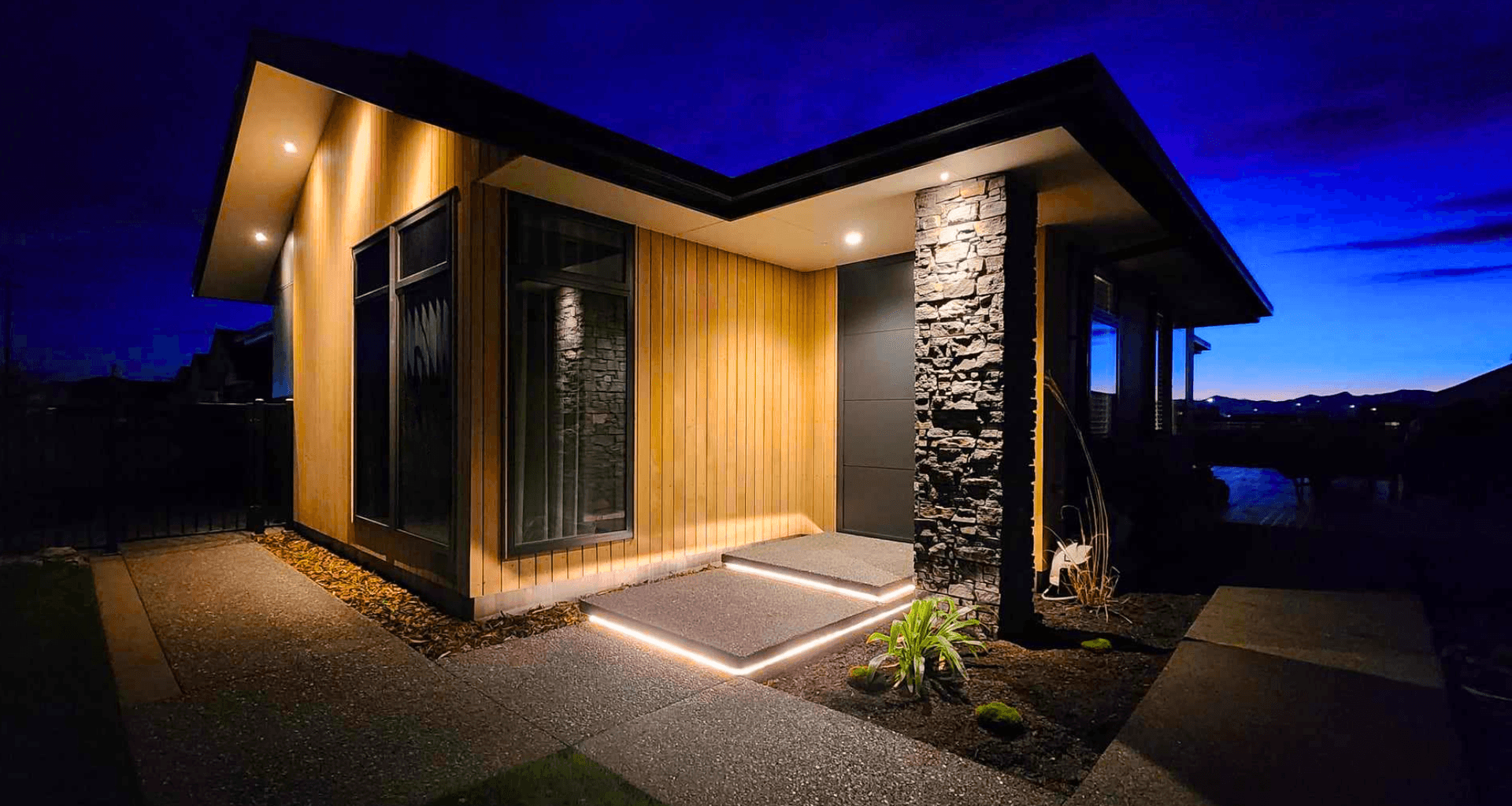 Innovative LED-lit steps for this home's entryway as seen in Concrete Unlimited's Hanworth Road Project