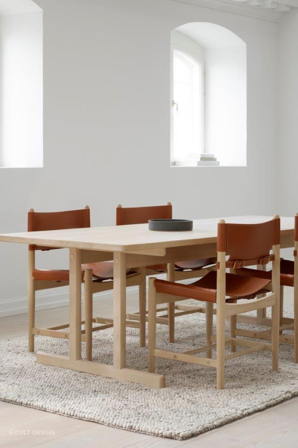 An oak dining table is a stylish to a contemporary space.