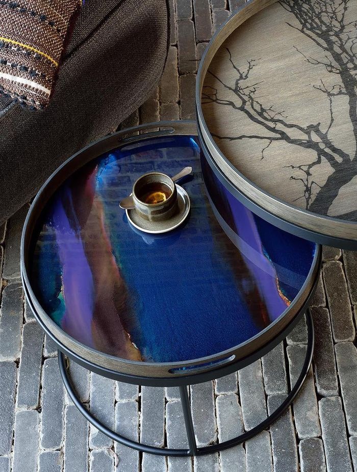 The raised edges on tray coffee tables help ensure items and valuables stay in place.