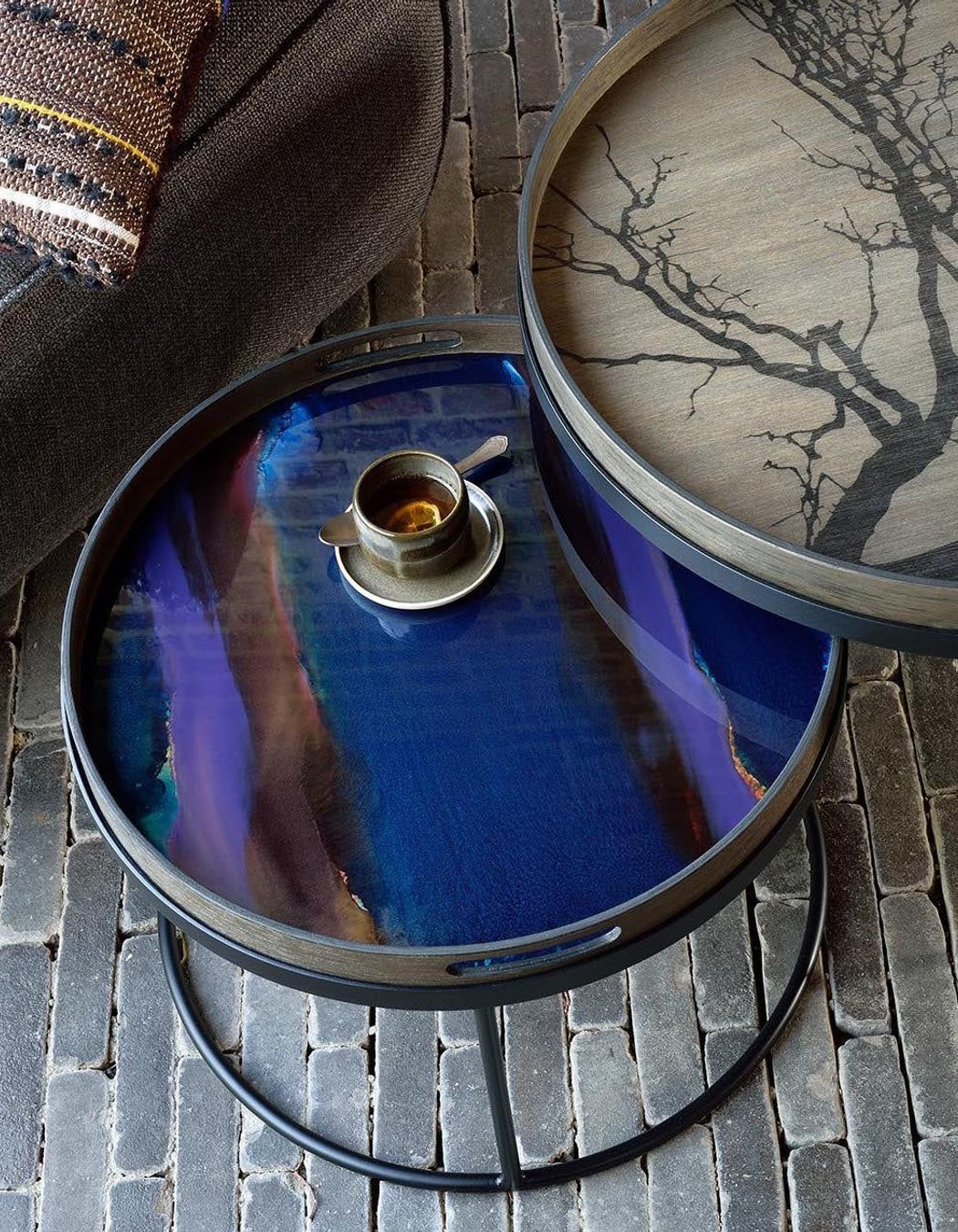 The raised edges on tray coffee tables help ensure items and valuables stay in place.