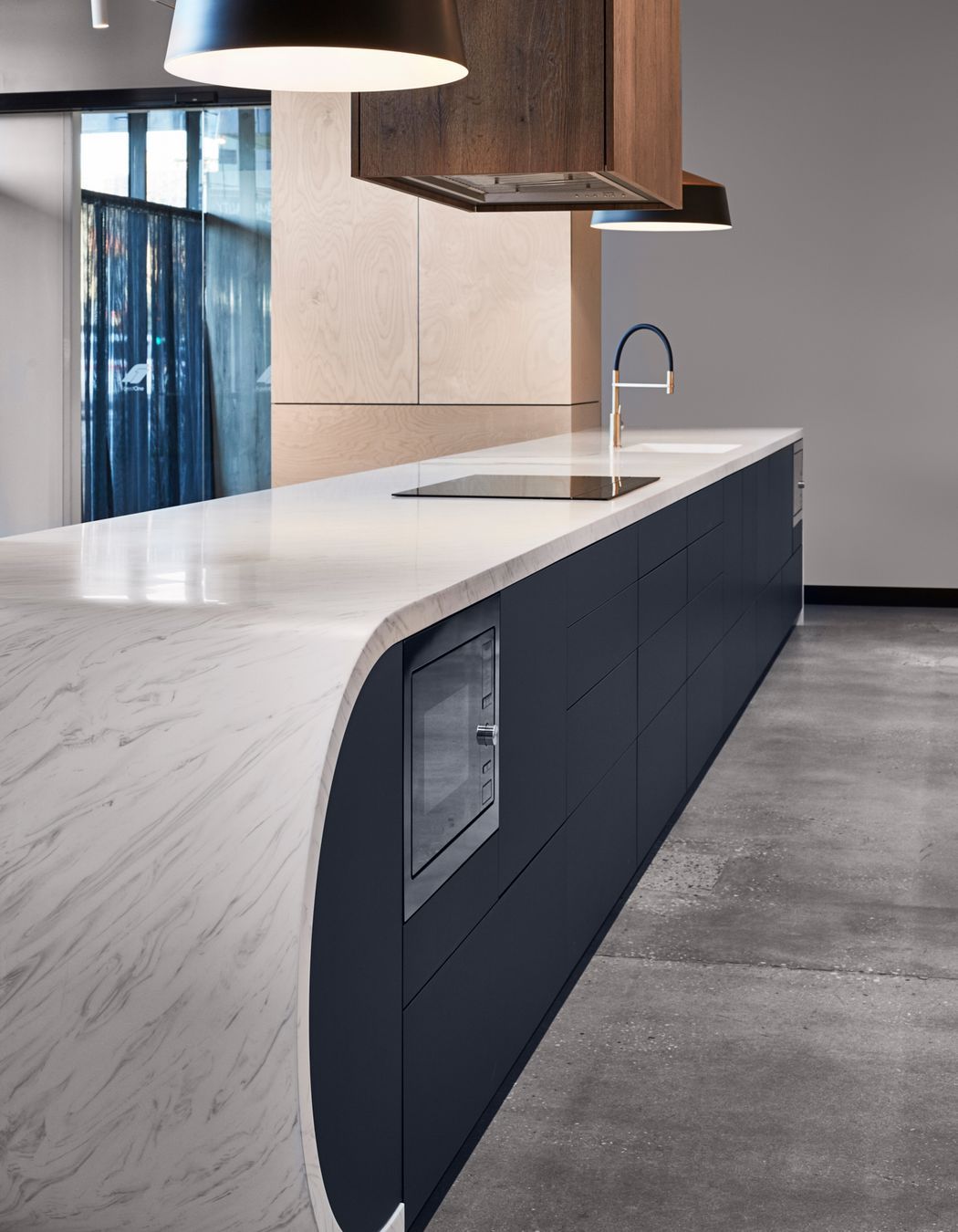 Premium acrylic benchtops, like the Meganite from ForestOne, can be moulded into unique shapes.