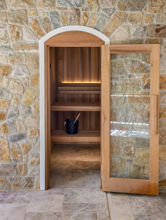 On both floors and walls, natural stone can add character, texture and depth to a space.