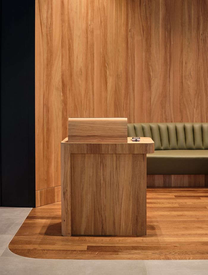 Clear wayfinding is important; visitors should easily understand where to go. This beautifully crafted Maitre'D stand is a great example of pairing logical wayfinding with highly-crafted design.