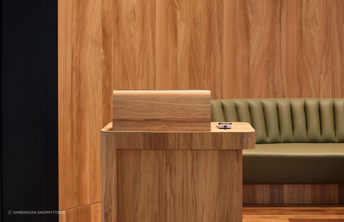 Clear wayfinding is important; visitors should easily understand where to go. This beautifully crafted Maitre'D stand is a great example of pairing logical wayfinding with highly-crafted design.