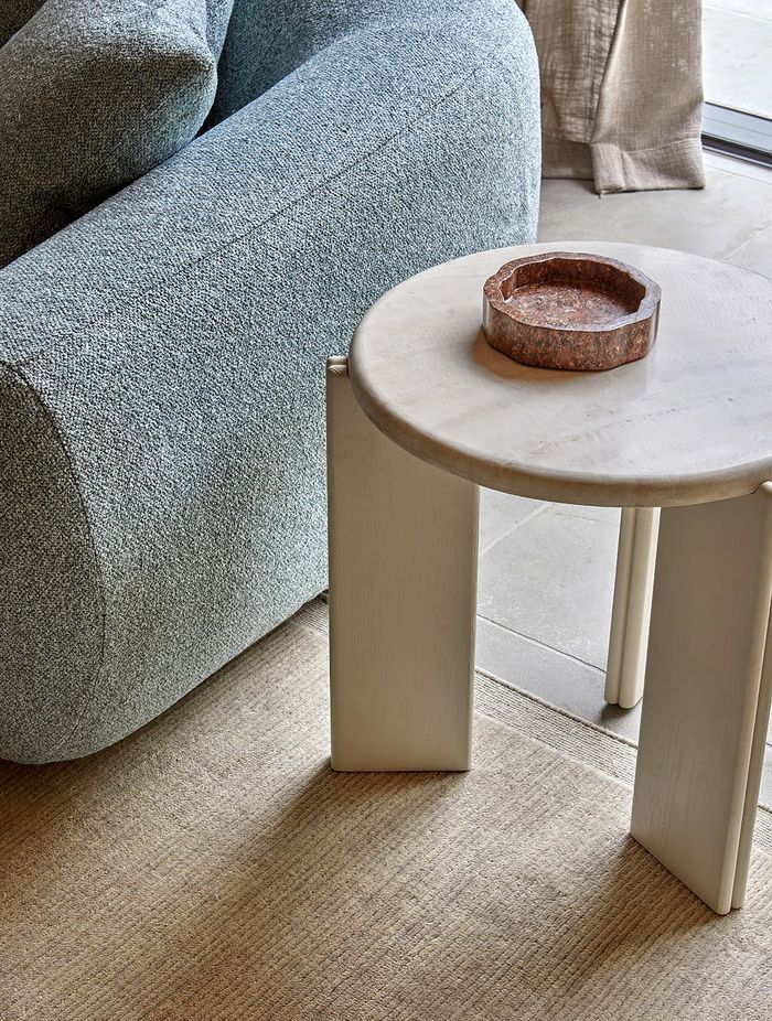 Pictured here: Ray Marble Side Table, Felix Loop 3 Seater Sofa, Rufus Ares Bowl, Bower Frame Rug (Cloud)